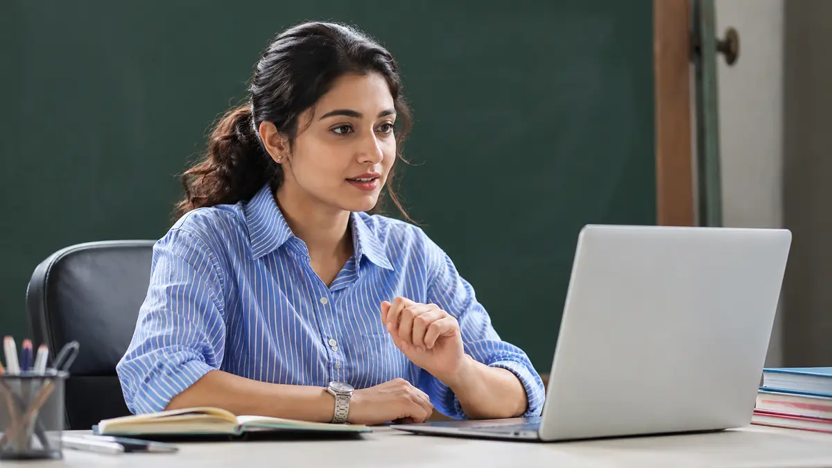 Indian engineering student preparing for the Wipro Elite NTH online assessment at a desk